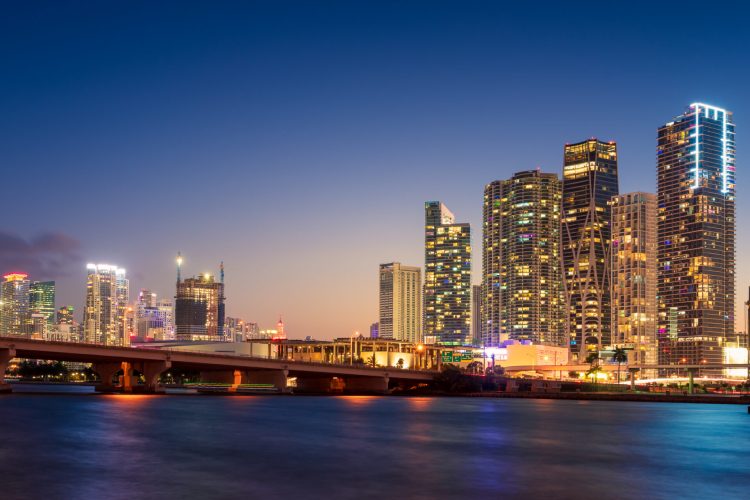 Miami City Skyline and MacArthur Causeway Illuminated at Night, Florida, USA